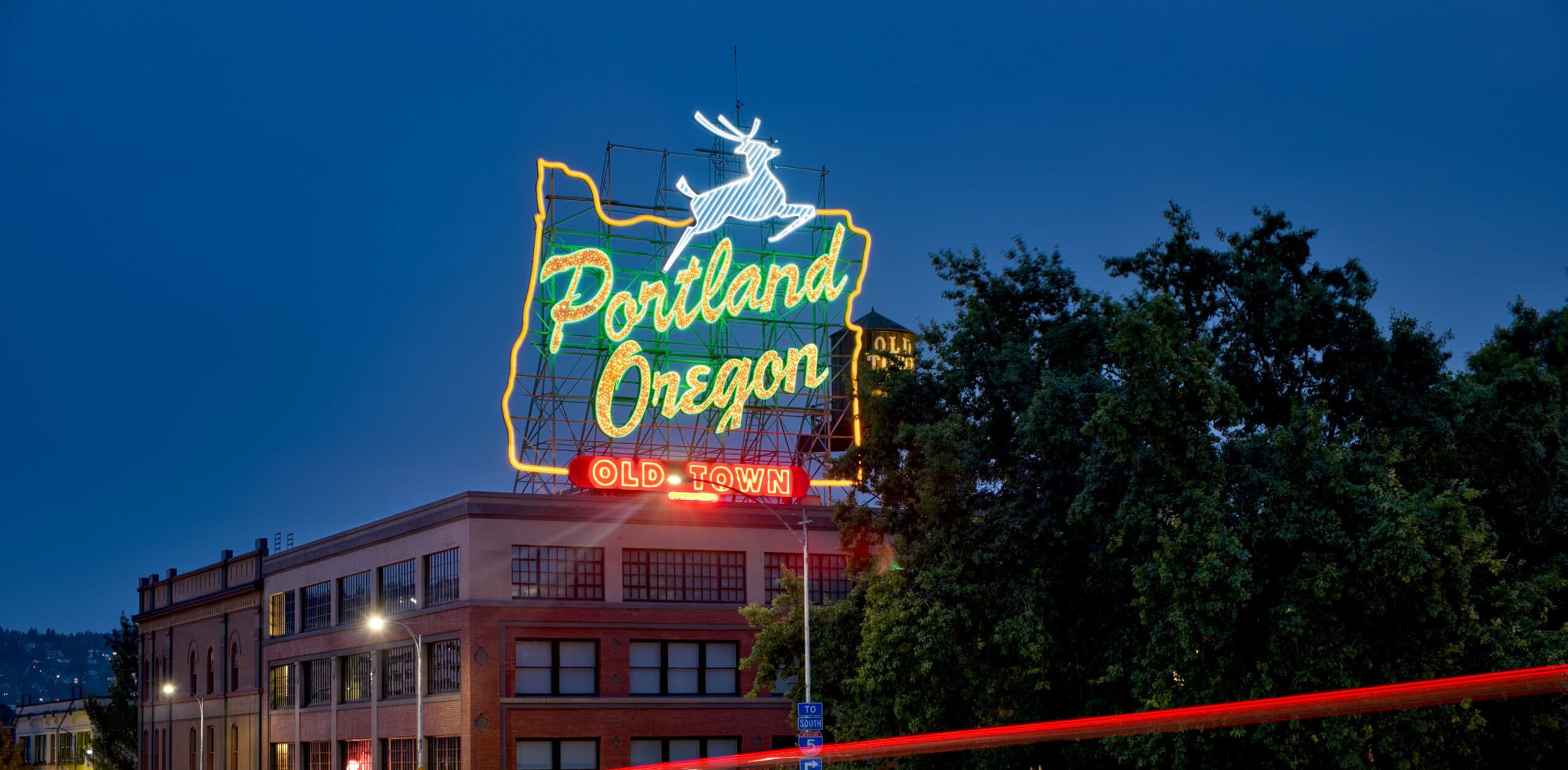 Portland Oregon Old Town neon sign at dusk.