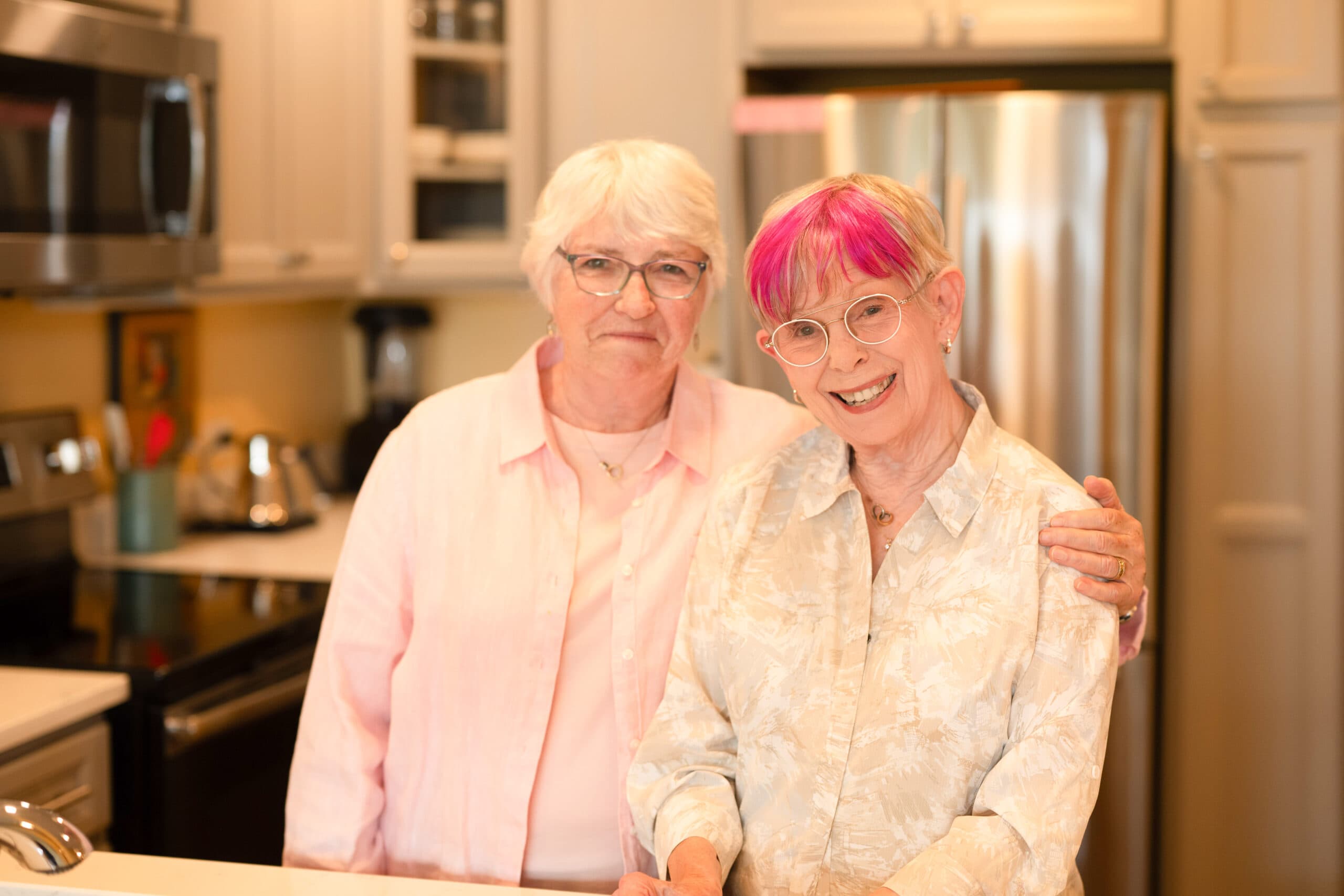 Holladay Park Plaza residents Mary and Mary Beth smile for the camera.